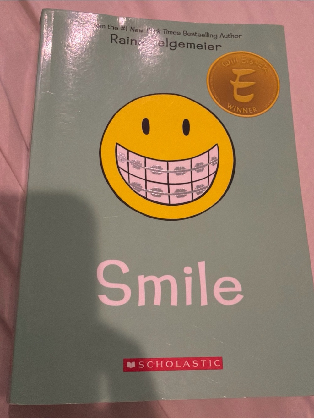 Scholastic Mint Green Paperback with Yellow Accent